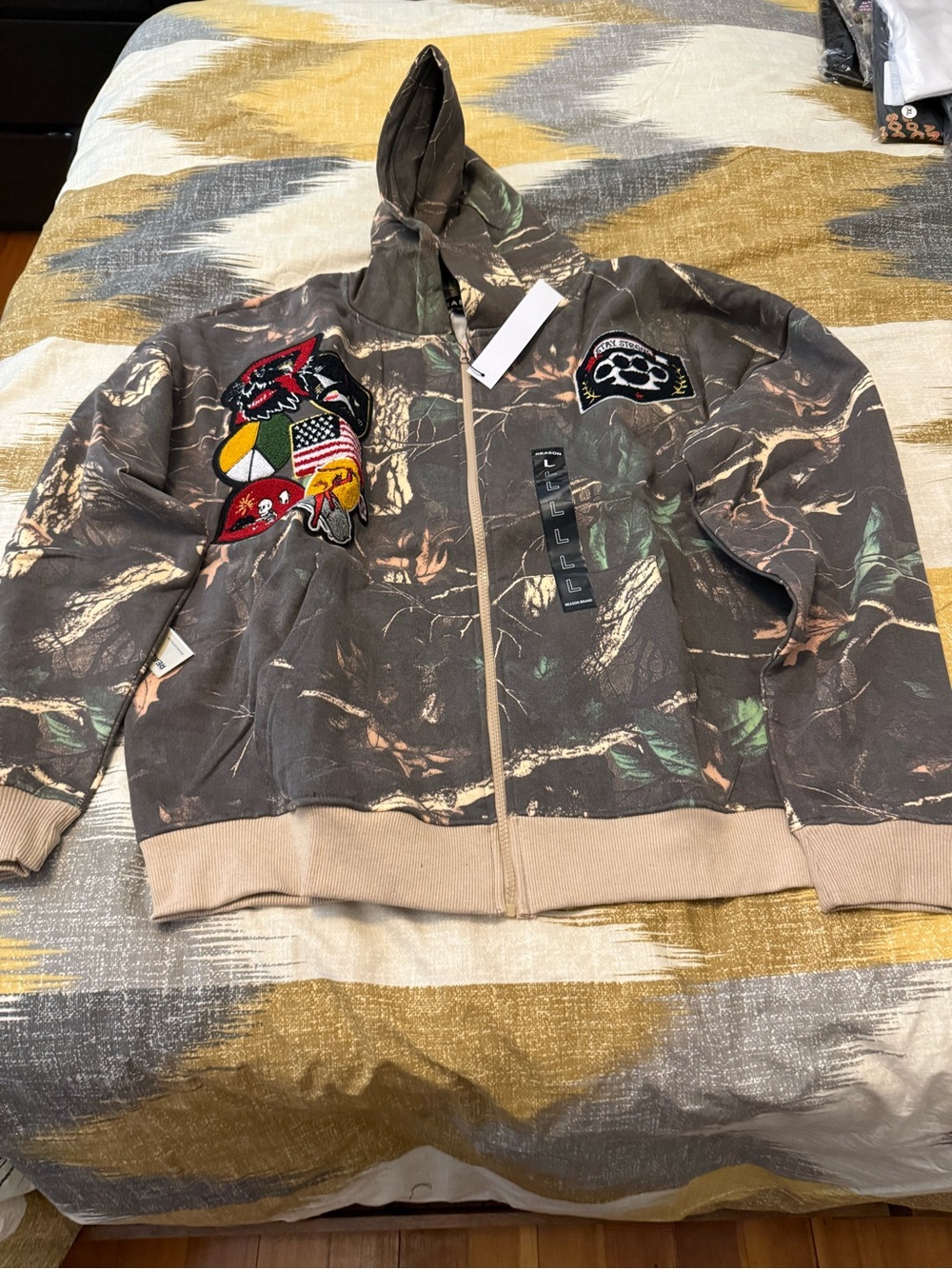 Reason Men's Hooded Zip Jacket in Brown Camo with Multicolor Patches